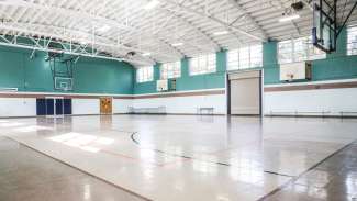 Method Road Park gym with basketball hoops and court