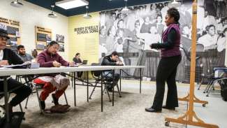 An instructor teaching an ESL class at Method Road Park