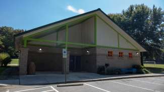 Exterior shot of Peach Road Park community center