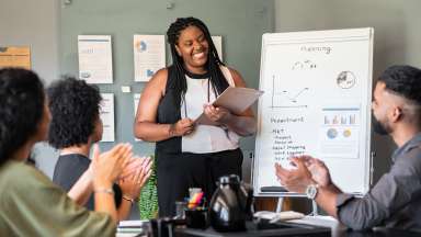 woman giving flipchart presentation in the office