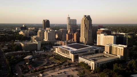 An aerial view of Raleigh's skyline near dusk