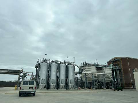 A van is parked in front of Raleigh's new bioenergy facility.