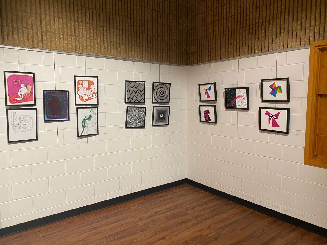 artworks by the students of Peter Marin hanging on Wall