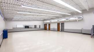 A large open meeting room with windows at Tarboro Road